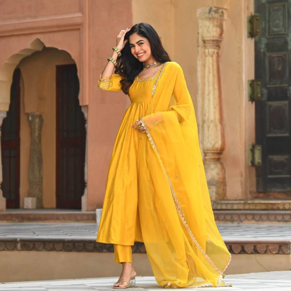 Bunaai - Always prefer the stunning yellow dress for a shining and stylish  look. The red dupatta with yellow tassels makes it look majestic. Add a  fresh look in your closet with